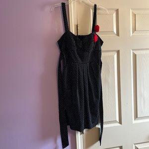 Dress with pockets! Two little roses on the strap.